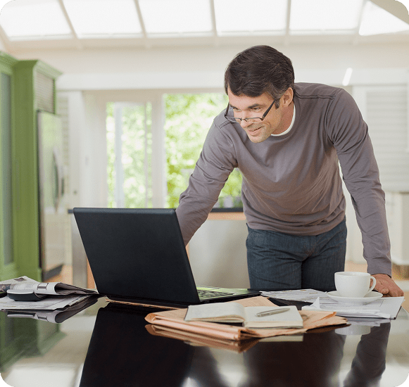 Person smiling while using a computer