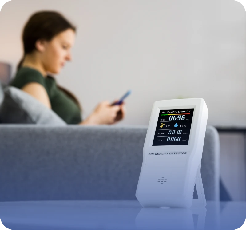 Woman using phone on couch